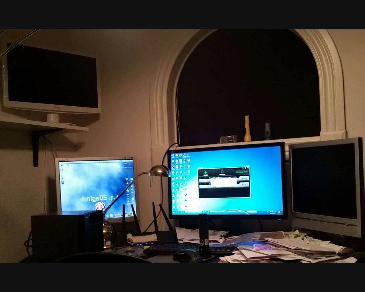 My battlestation-AOS4.1, Win7 and WinXP (and NAS and router)